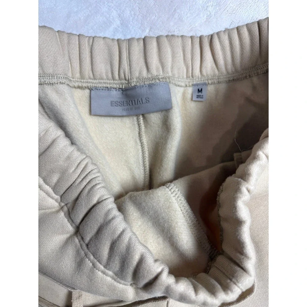 Men's medium Fear of God Essentials baggy sand colored sweat shorts. NEW.
